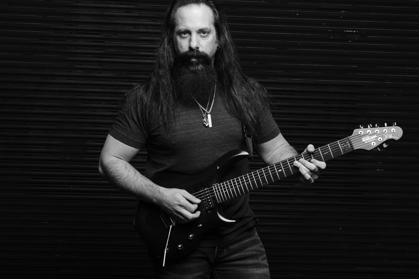 吉他教学_John_Petrucci_-_The_Astonishing_Young_Guitar_拨片网.png